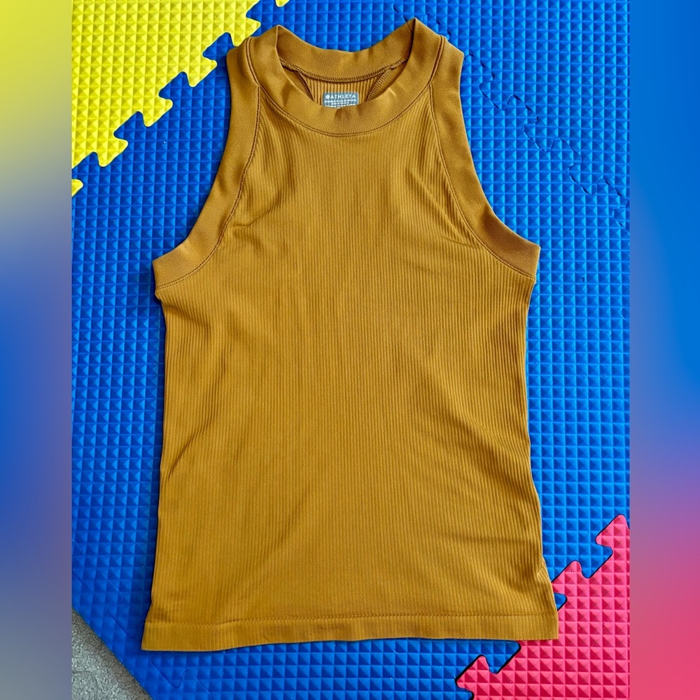 Athleta Renew Seamless Racerback Tank in Tuscan
Gold Size Small